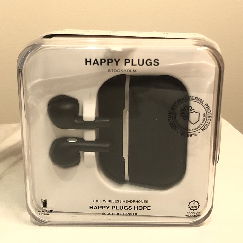 New but opened. Happy Plugs Black Wireless Headphones